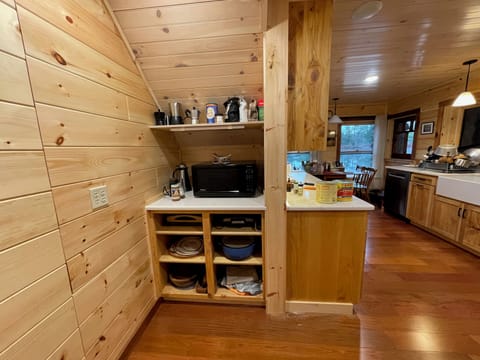 Under-stairs nook with large microwave