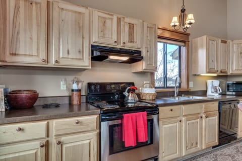 Fully stocked kitchen; electric range/oven