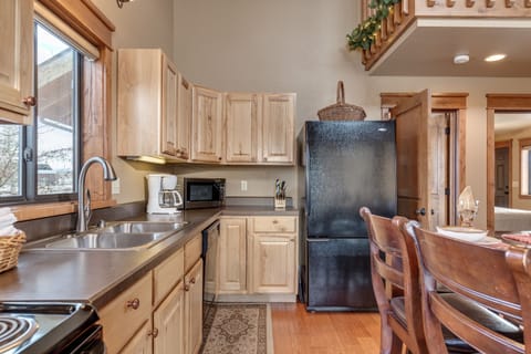 Fully stocked kitchen; two ground floor bedrooms adjacent to kitchen/living room
