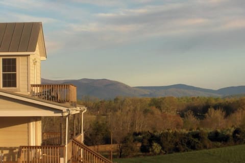 The Front Door of the Cottage with the Blue Ridge Mtns in the distance.