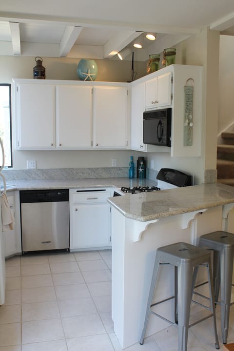 Kitchen with Granite Counter-tops and all the Amenities.