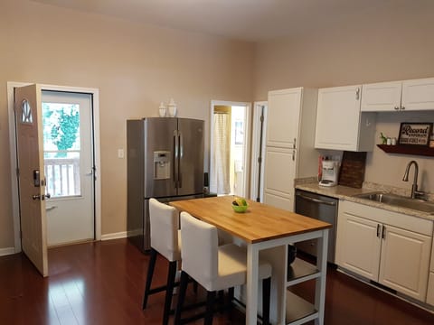 Relax with view of serene backyard from the kitchen, living and dining rooms!