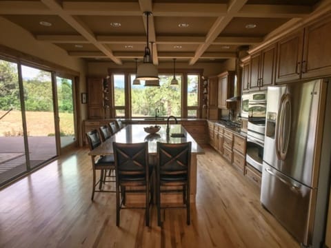 The sliding glass doors on the left bring in the feeling of the outdoors.