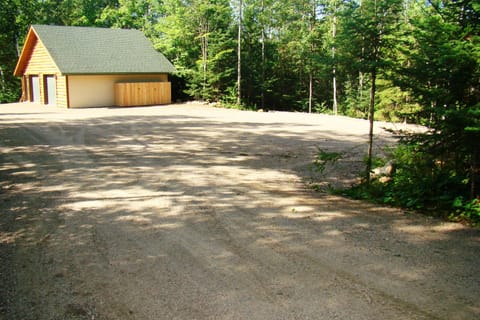 Very large parking space for vehicles, trailers, and RV's.