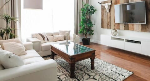 We are Superhost since 2015, with over 3500 great reviews ! We have all the city permits and insurance required.  * 100% LEGAL * This is the wide and bright living room with 55" Smart Roku HD TV. Contact us! Contactez-nous!