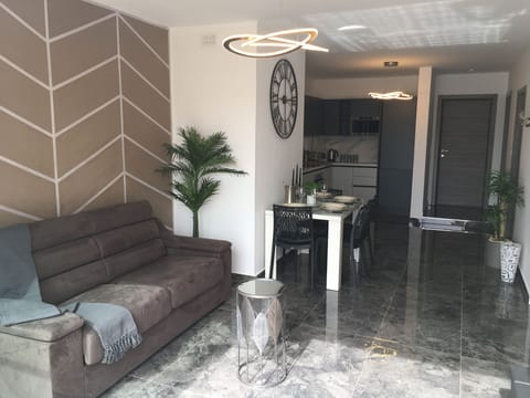 Open Plan Kitchen / Dining / Living including Free Wifi  / AC / 55" TV