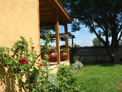 Front porch and large fenced yard