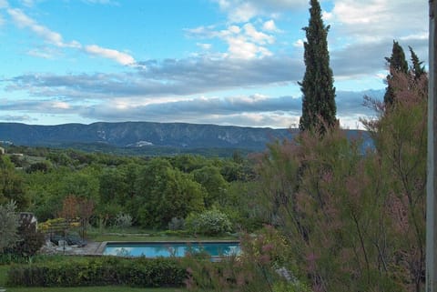Pool and Luberon at sunset from wing bedroom.