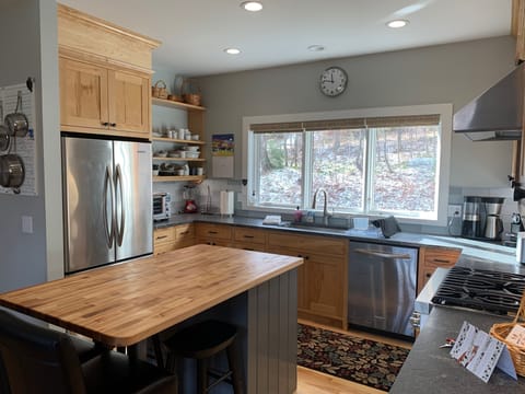 Breville oven, OXO coffee maker, Nespresso maker with fully stocked dishware 