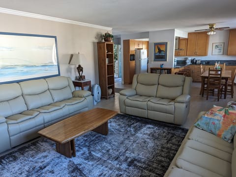 Open concept living, dining and kitchen offer a spacious living area.