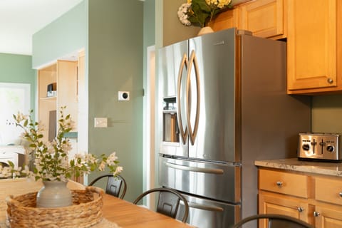 Cook up a meal in the fully stocked kitchen.