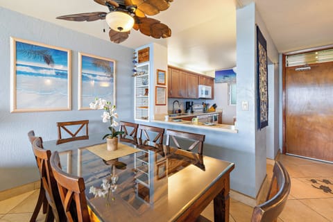 Dining area with kitchen and front entryway