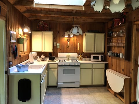 Full kitchen with everything,  to include wine opener and  sharp knives !