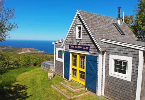 classic oceanside cottage with stunning views over ocean, beach and island.