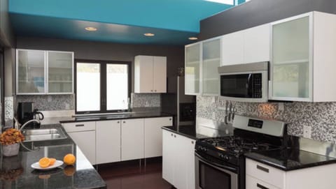 The kitchen is updated with granite countertops and stainless appliances.   