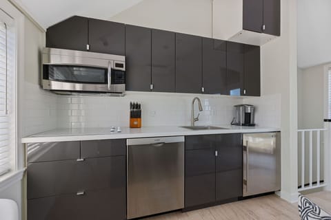 Fully stocked, modern kitchen with all of the conveniences of home
