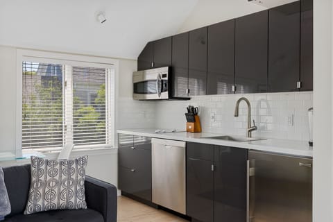 Fully stocked, modern kitchen with all of the conveniences of home