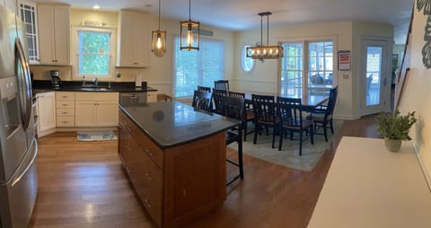 kitchen opens to the main living room and 2 screen porches