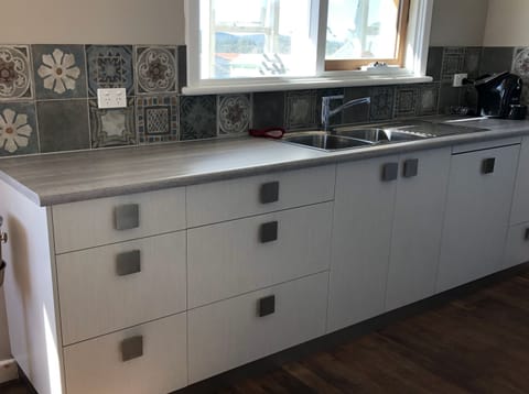 Modern kitchen with dishwasher.