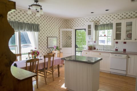 The farmhouse kitchen is fully equipped for cooking and dining