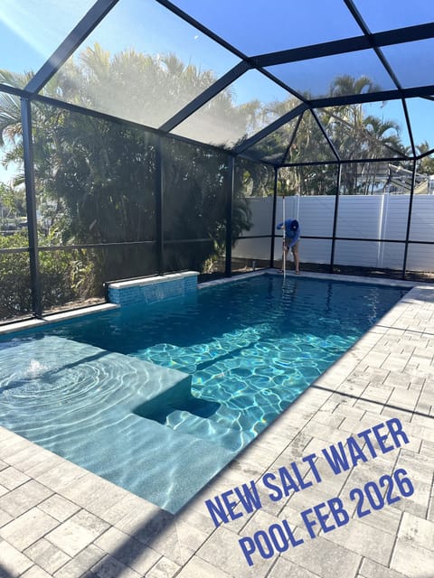 NEW Saltwater pool featuring sundeck with bubbler and waterfall feature. 
