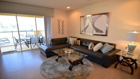 Living area with sliding doors to the pool deck