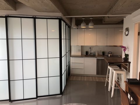 Glass sliding doors open up the space or keep it private and cozy.