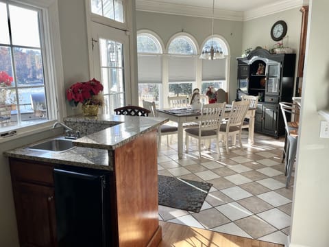 Wet bar with under counter ice maker.