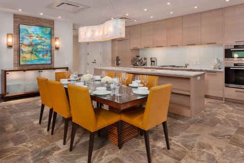 Open concept kitchen and dining leading into the enormous Great Room