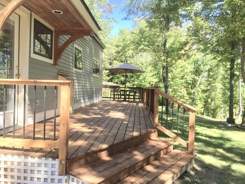 Wrap around deck accessible from master bedroom and kitchen
