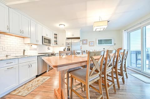 Newly remodeled kitchen with large table that seats 10
