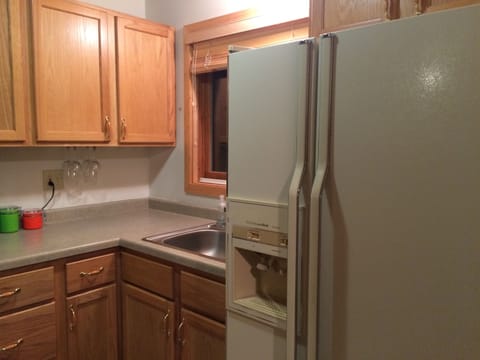Kitchen. Refrigerator has water and ice dispenser. Water is good, but runs slow.
