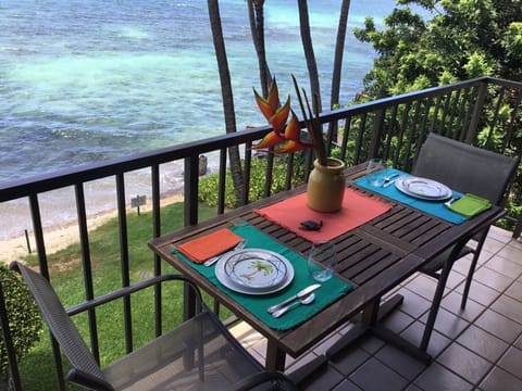 Enjoy the surf while eating on the lanai.