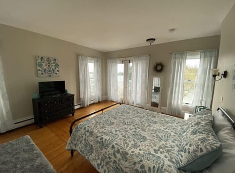 Primary bedroom with private balcony 