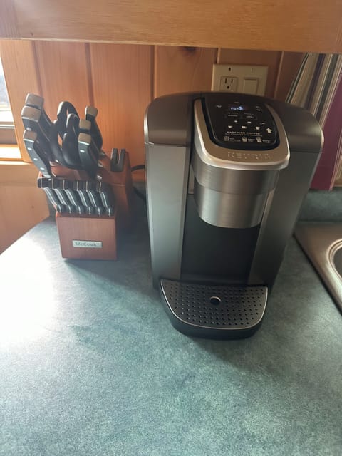 Keurig coffee maker and McCook knives. We also have a regular coffee pot.