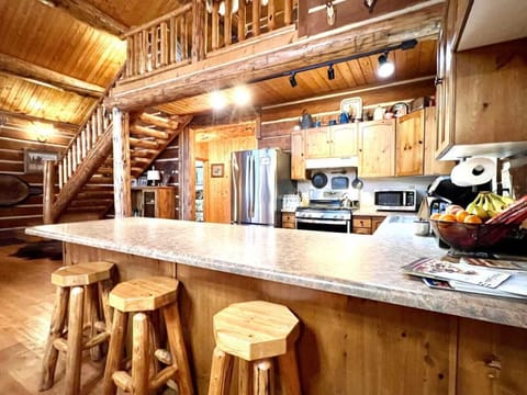 Kitchen with bar and new appliances