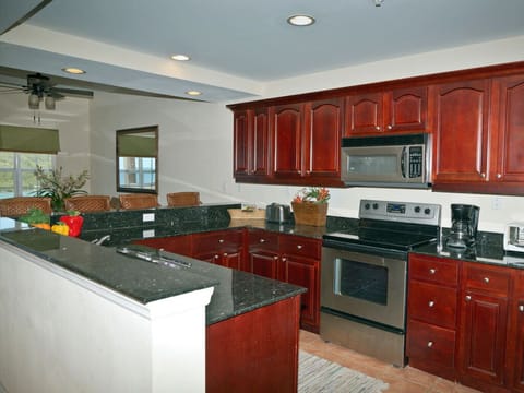 Fully equipped kitchen with stainless steel appliances