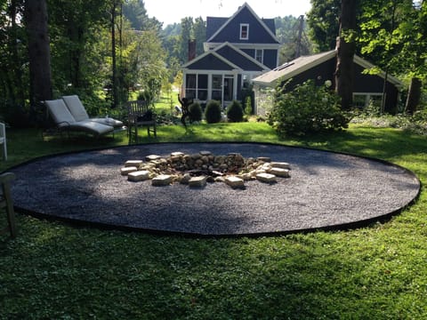 Fire pit in back garden.  Tucked In is in the right forefront.