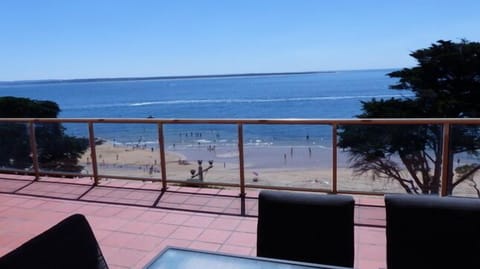 Directly opposite beach. 