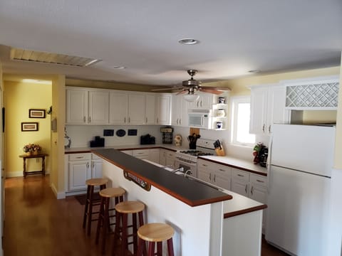 Fully stocked with lots of counterspace.  A second fridge downstairs.