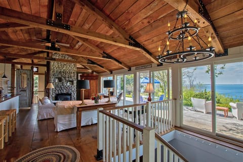 Great Room expanse of ocean, wide pine floors, uber-private setting on the sea