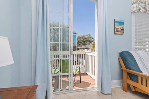 Private views, poolside perks! This main-floor bedroom offers direct access to its own balcony overlooking the poolโperfect for starting your day with a breeze and ending it with a sunset.