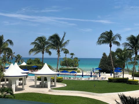 View of the Pool and Beach from the Balcony
overlooking the ocean.
