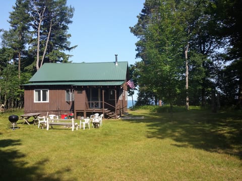 View of back of cottage with Lake Michigan beyond