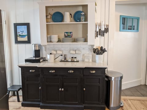 Kitchen prep space and coffee bar.