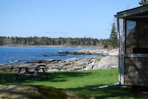 Enjoy the ocean breeze from the screened-in porch...