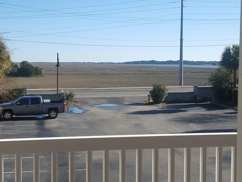 View out the front door and both guest bed rooms.
