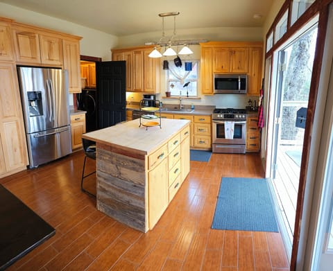 The island makes a great space to set drinks and snacks or prep your meals.