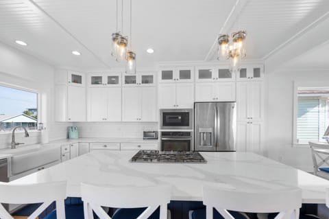 Cook and chat all together in this large kitchen.