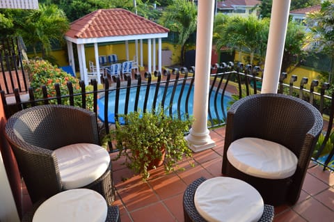 Pool and cabana view from one of 3 balconies with seating